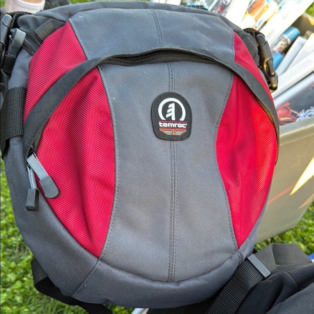 Gray and Red Tamrac camera backpack Bag single strap crossbody